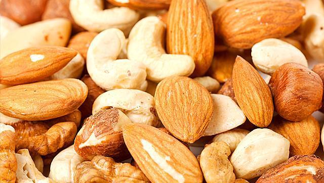 Cut portion to healthily enjoy nuts. (Shutterstock)