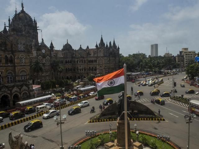 A flag flutters on the Brihanmumbai Municipal Corporation  premises in Mumbai on Monday. (satish bate/ Ht photo) 