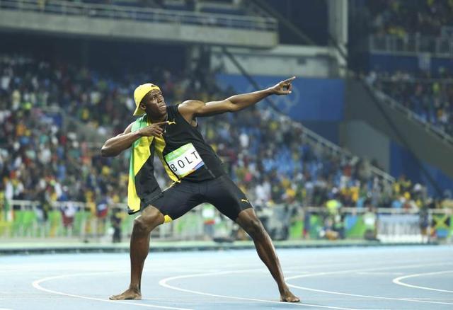 Usain strikes his popular ‘lightening Bolt’ pose after the win. (Reuters Photo) Usain strikes his popular ‘lightening Bolt’ pose after the win. (Reuters Photo)