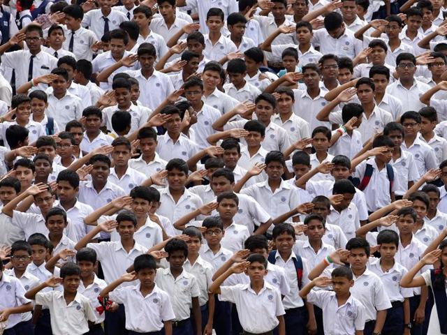 Students of Abhinav Vidya Mandir take part in the Independance Day celebrations on the school ground in Bhayander, Mumbai , on Monday. (Pratham Gokhale/HT PHOTO) 