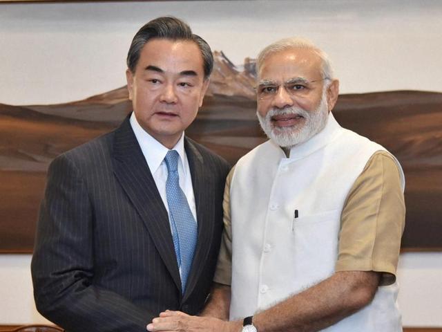 Chinese Foreign Minister Wang Yi with Prime Minister Narendra Modi during the former’s visit in New Delhi on Saturday. (AP) Chinese Foreign Minister Wang Yi with Prime Minister Narendra Modi during the former’s visit in New Delhi on Saturday. (AP)