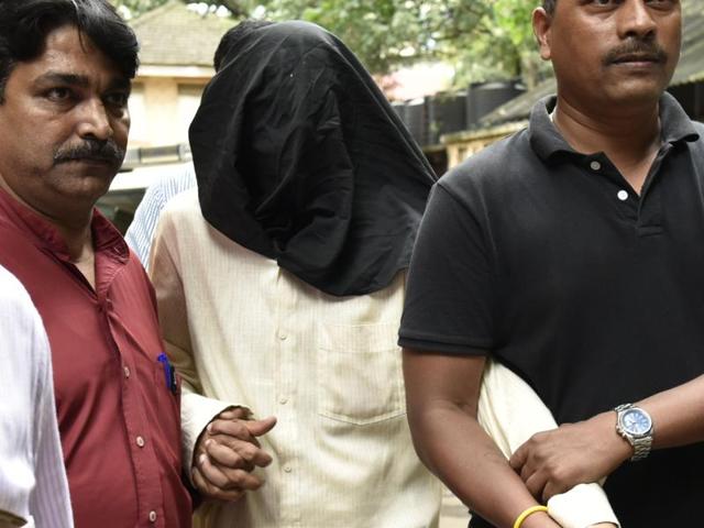 Mohammad Haneef outside a court in the city on Sunday.(Arijit Sen/HT PHOTO)