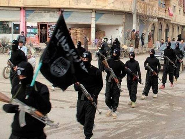 This undated file image posted on an extremist website on January 14, 2014, shows fighters from the Islamic State group marching in Raqqa, Syria. (AP) This undated file image posted on an extremist website on January 14, 2014, shows fighters from the Islamic State group marching in Raqqa, Syria. (AP)