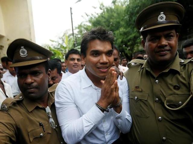 Namal Rajapaksa (C), son of former Sri Lanka's President Mahinda Rajapaksa, leaves with prison officers at court after being arrested in Colombo, Sri Lanka July 11, 2016. (Reuters) Namal Rajapaksa (C), son of former Sri Lanka's President Mahinda Rajapaksa, leaves with prison officers at court after being arrested in Colombo, Sri Lanka July 11, 2016. (Reuters)