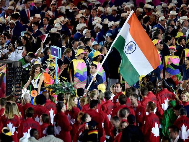 The Indian contingent marches during the opening ceremony of the 2016 Summer Olympics in Rio de Janeiro. (PTI Photo) The Indian contingent marches during the opening ceremony of the 2016 Summer Olympics in Rio de Janeiro. (PTI Photo)