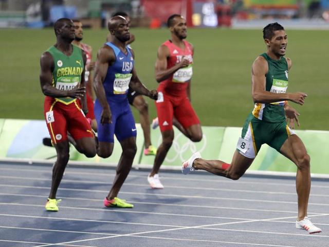 Van Niekerk is the first ever runner to go under 10 seconds for the first 100m, 20 seconds for 200m and 44 seconds for 400m. (AP Photo)