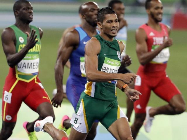 Van Niekerk , from Cape Town, went quickly off the block and it looked as though both Kirani James (left), the London Olympics gold medallist and LaShawn Merritt (US) would eventually reel him in at the bends. But instead, Van Niekerk just kept increasing his lead. (AP Photo)