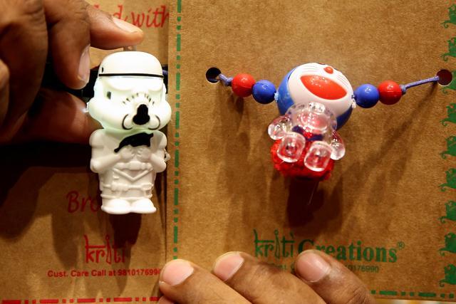 Rakhis themed on Star Wars and Doraemon are popular in Khan Market. (Prabhas Roy/HT Photo)