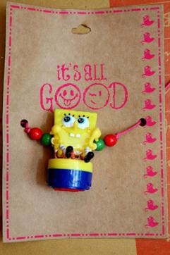 A SpongeBob shaped rakhi which lights up, and also has a stamp below it. (Prabhas Roy/HT Photo)