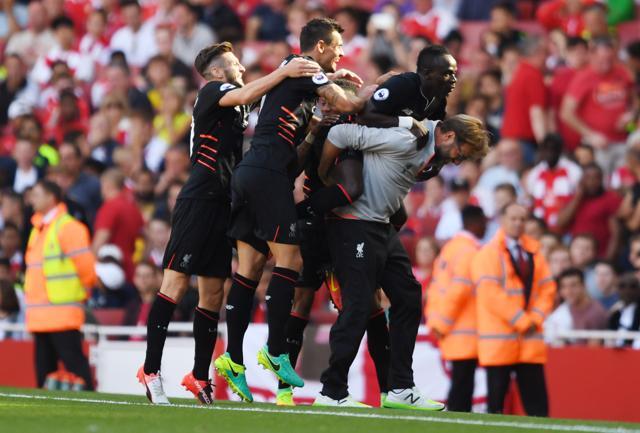 Sadio Mane celebrates scoring Liverpool’s fourth goal with Juergen Klopp, Adam Lallana, Dejan Lovren and teammates. (REUTERS) Sadio Mane celebrates scoring Liverpool’s fourth goal with Juergen Klopp, Adam Lallana, Dejan Lovren and teammates. (REUTERS)