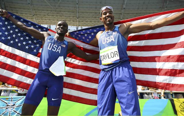 Christian Taylor of USA and teammate Will Claye celebrate after winning gold and silver respectively. (REUTERS) Christian Taylor of USA and teammate Will Claye celebrate after winning gold and silver respectively. (REUTERS)