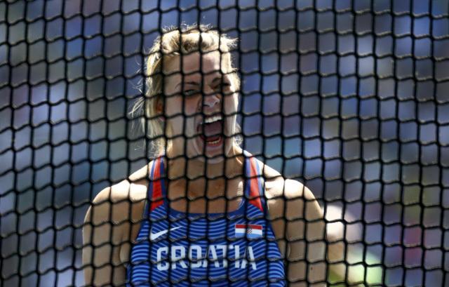 Sandra Perkovic of Croatia reacts after a throw. (REUTERS) Sandra Perkovic of Croatia reacts after a throw. (REUTERS)