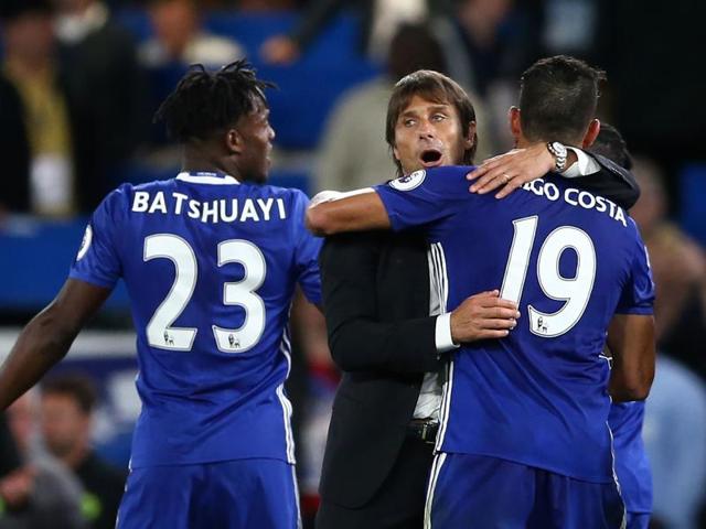Chelsea coach Antonio Conte (left) had Diego Costa (right) to thank for a winning start to their Premier League campaign. (REUTERS) Chelsea coach Antonio Conte (left) had Diego Costa (right) to thank for a winning start to their Premier League campaign. (REUTERS)