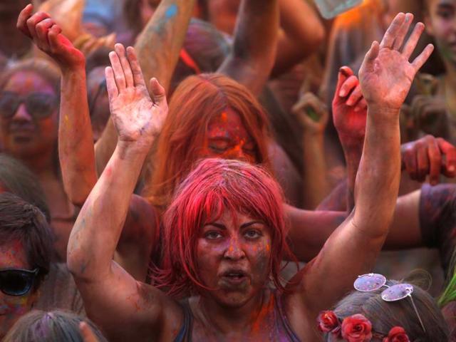Today, Holi is played with great fervour across world in places such as Mauritius, South Africa, Trinidad and Tobago and wherever you find the Indian diaspora. A red-head or a Holi reveller? (REUTERS) 