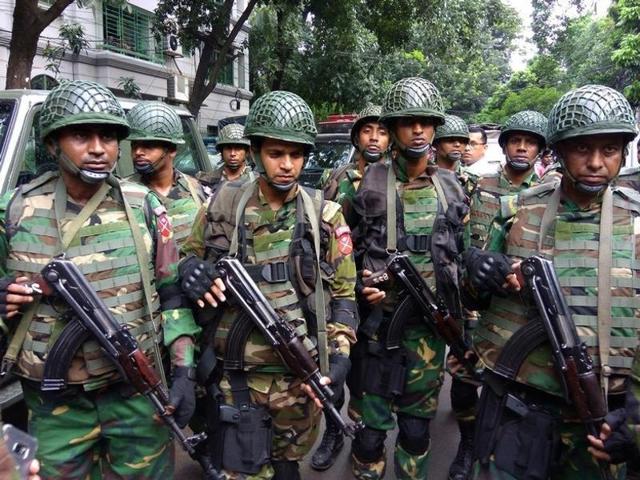 File photo of policemen standing guard along a road leading to the Holey Artisan Bakery after gunmen attacked the cafe in Dhaka on July 1. (Reuters) File photo of policemen standing guard along a road leading to the Holey Artisan Bakery after gunmen attacked the cafe in Dhaka on July 1. (Reuters)