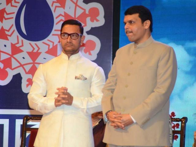 Maharashtra Chief Minister Devendra Fadnavis and actor Aamir Khan during The Satyamev Jayate Water Cup Awards 2016. (IANS)
