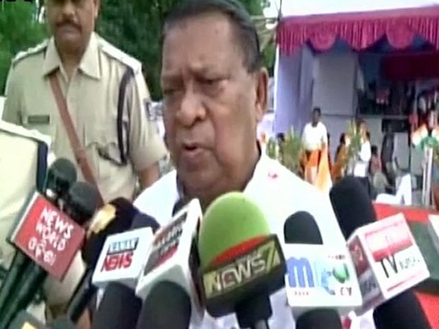 Odisha minister Jogendra Behera was seen getting his shoelaces tied by his personal security officer at an I-Day event on Monday. (ANI) Odisha minister Jogendra Behera was seen getting his shoelaces tied by his personal security officer at an I-Day event on Monday. (ANI)