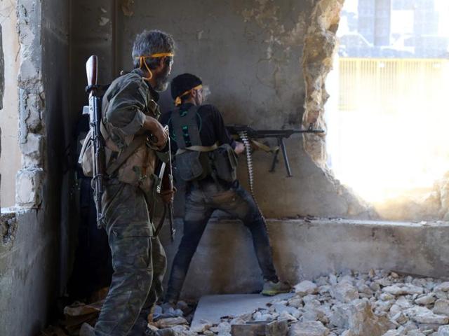File photo of rebel fighters firing owards positions of regime forces in Ramussa on the southwestern edges of Syria's northern city of Aleppo on August 6, 2016. Russia said on August 16 that its warplanes fired at Syrian rebels from an Iranian strip for the first time. (AFP) File photo of rebel fighters firing owards positions of regime forces in Ramussa on the southwestern edges of Syria's northern city of Aleppo on August 6, 2016. Russia said on August 16 that its warplanes fired at Syrian rebels from an Iranian strip for the first time. (AFP)