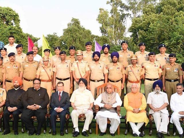 (From right) Punjab Vidhan Sabha speaker Charanjit Singh Atwal, Haryana chief minister Manohar Lal Khattar, his Punjab counterpart Parkash Singh Badal, Punjab and Haryana governor Kaptan Singh Solanki, Punjab and Haryana high court chief justice Shiavax Jal Vazifdar, Punjab chief secretary Sarvesh Kaushal and Chandigarh SSP Sukhchain Singh Gill posing with police awardees (Sanjeev Sharma/HT Photo) (From right) Punjab Vidhan Sabha speaker Charanjit Singh Atwal, Haryana chief minister Manohar Lal Khattar, his Punjab counterpart Parkash Singh Badal, Punjab and Haryana governor Kaptan Singh Solanki, Punjab and Haryana high court chief justice Shiavax Jal Vazifdar, Punjab chief secretary Sarvesh Kaushal and Chandigarh SSP Sukhchain Singh Gill posing with police awardees (Sanjeev Sharma/HT Photo)