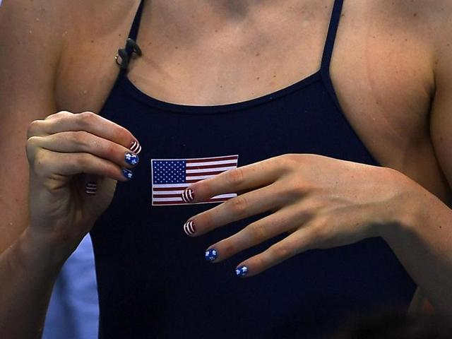 US swimmer and five-time Olympic gold medalist Missy Franklin has a matchy-matchy moment. (Pinterest) 