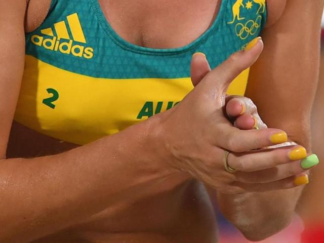 Volleyballer Nicole Laird’s manicure pays homage to Australia’s penchant for yellow and green. (Pinterest) 