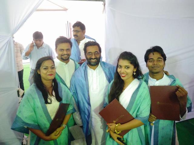 Prof Deepak Mathew (centre) with IIT Hyderabad students at the convocation.(Handout image)