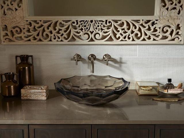 The very elegant Briolette glass sink in a neutral doe colour.(Kohler)