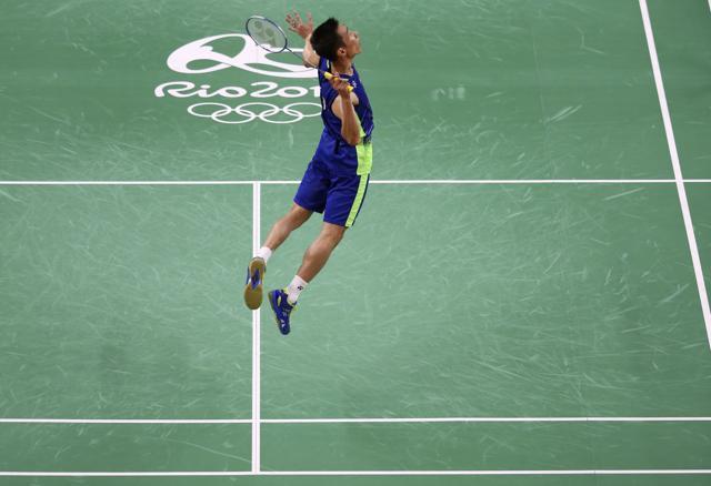 Chong Wei Lee hits a smash. (REUTERS) Chong Wei Lee hits a smash. (REUTERS)