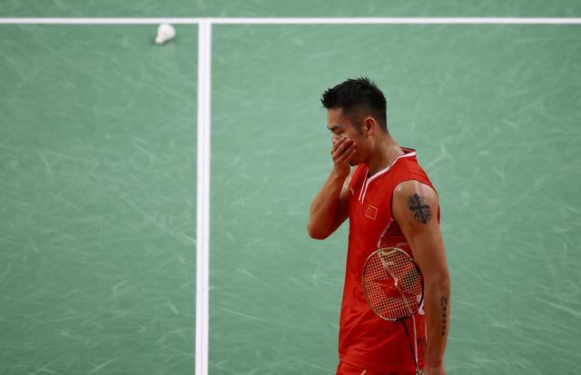 Lin Dan reacts after losing a point. (REUTERS) Lin Dan reacts after losing a point. (REUTERS)