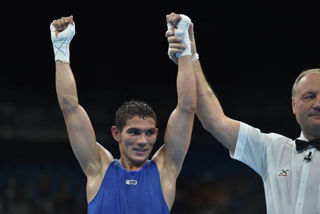 Colombia's Ceiber David Avila celebrates after winning against Mexico's Elias Abarca during the men's 52kg bout at the Riocentro on Tuesday. (AFP) Colombia's Ceiber David Avila celebrates after winning against Mexico's Elias Abarca during the men's 52kg bout at the Riocentro on Tuesday. (AFP)