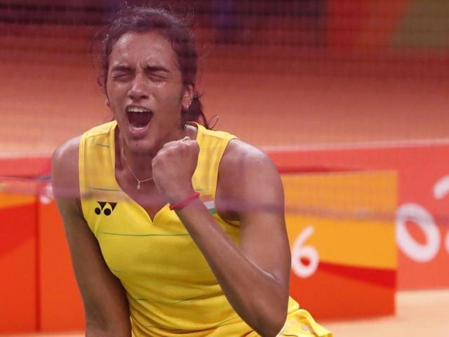 PV Sindhu celebrates after winning her match against Yihan Wang.(REUTERS Photo)