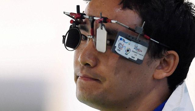 Jitu Rai reacts during the men's 50m pistol qualifying round at the Summer Olympic 2016 at Rio de Janeiro, Brazil. (PTI) Jitu Rai reacts during the men's 50m pistol qualifying round at the Summer Olympic 2016 at Rio de Janeiro, Brazil. (PTI)