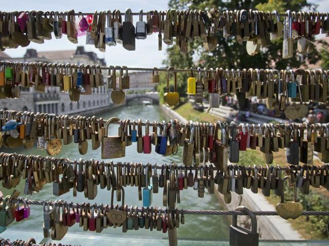 Padlocks left by couples hang at a bridge in Ljubljana. (AP) 