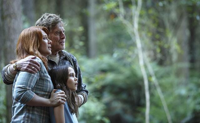 Bryce Dallas Howard is Grace, Robert Redford is Mr. Meacham and Oona Laurence is Natalie in Disney's Pete's Dragon, the adventure of an orphaned boy and his best friend Elliott, who just so happens to be a dragon. (Disney) Bryce Dallas Howard is Grace, Robert Redford is Mr. Meacham and Oona Laurence is Natalie in Disney's Pete's Dragon, the adventure of an orphaned boy and his best friend Elliott, who just so happens to be a dragon. (Disney)