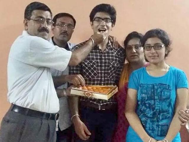 Raghav Arora who achieved 41st rank in the National Eligibility-cum- Entrance Test in a jubilant mood after the results in Amritsar.(HT Photo)