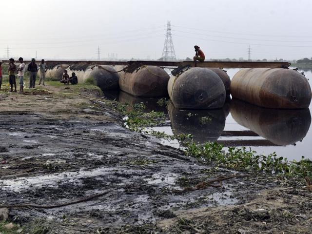An NGT-appointed expert panel has said that Yamuna’s floodplain was “completely destroyed” and the ground was devoid of water bodies and vegetation because of the festival held in March. (Hindustan Times Photo) An NGT-appointed expert panel has said that Yamuna’s floodplain was “completely destroyed” and the ground was devoid of water bodies and vegetation because of the festival held in March. (Hindustan Times Photo)