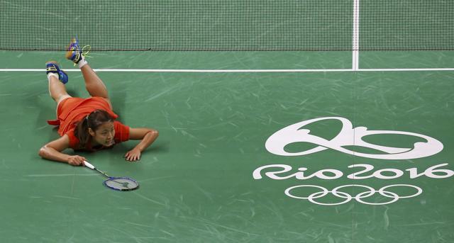 A short one from Sindhu forced Nozomi to make a despairing dive. (REUTERS) A short one from Sindhu forced Nozomi to make a despairing dive. (REUTERS)