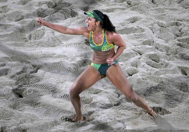 Agatha Bednarczuk of Brazil celebrates after the winning point. (REUTERS)