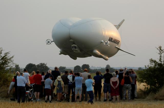 The Airlander 10 hybrid airship makes its maiden flight at Cardington Airfield. (REUTERS) The Airlander 10 hybrid airship makes its maiden flight at Cardington Airfield. (REUTERS)