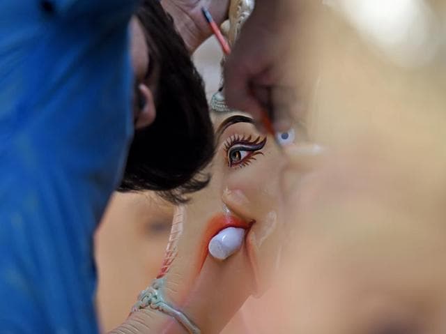Sneak peek: A man uses his sculpting tool at a workshop. (Pratik Chorge) 