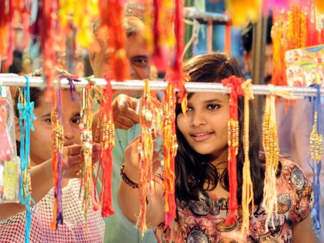 A special bond: Girls buying rakhis ahead of Raksha Bandhan festival at a shop in Qila Mubarak Chowk in Patiala on Wednesday. (bharat bhushan/ht photo) A special bond: Girls buying rakhis ahead of Raksha Bandhan festival at a shop in Qila Mubarak Chowk in Patiala on Wednesday. (bharat bhushan/ht photo)
