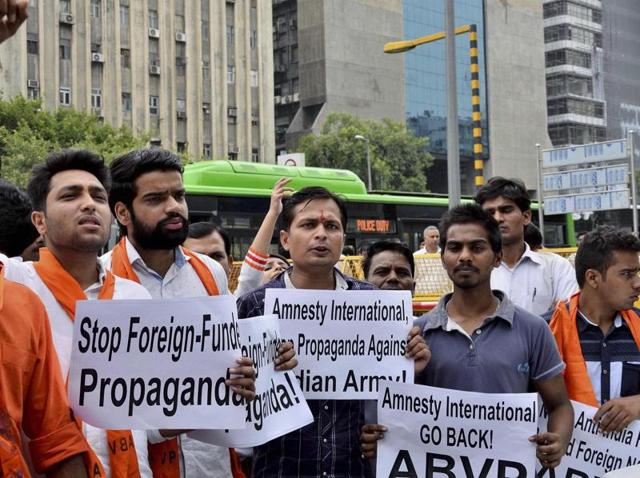 ABVP members shout slogans during a protest demonstration against Amnesty International India in New Delhi.(PTI) ABVP members shout slogans during a protest demonstration against Amnesty International India in New Delhi.(PTI)