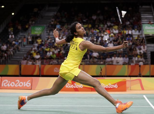 PV Sindhu returns serve against Japan's Nozomi Okuhara. (AP) PV Sindhu returns serve against Japan's Nozomi Okuhara. (AP)