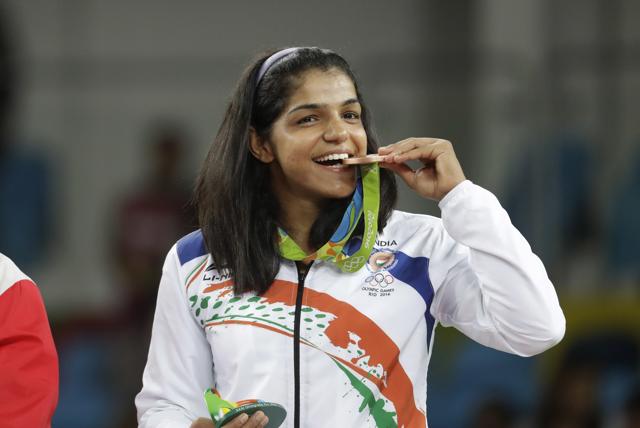 India's Sakshi Malik poses with her bronze medal for the women's wrestling freestyle 58-kg competition. (AP Photo) India's Sakshi Malik poses with her bronze medal for the women's wrestling freestyle 58-kg competition. (AP Photo)
