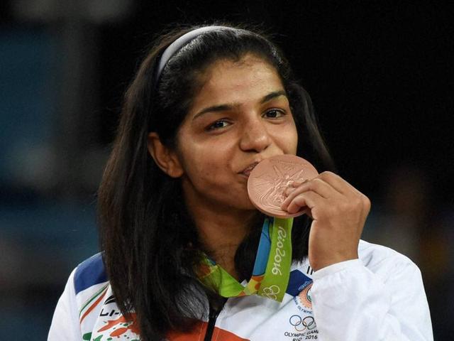 The Wrestling Federation of India had not entered Sakshi Malik’s name for the World Olympic qualification tournament, saying a senior wrestler like Geeta Phogat could not be ignored.(PTI)