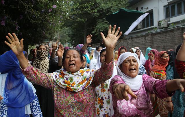 Kashmiri women shout slogans during a protest in Srinagar on Wednesday. (Waseem Andrabi/HT Photo) Kashmiri women shout slogans during a protest in Srinagar on Wednesday. (Waseem Andrabi/HT Photo)