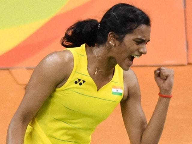 India's Sindhu Pusarla celebrate after defeating Japan's Nozomi Okuhara during a women's singles semifinal.(PTI Photo)