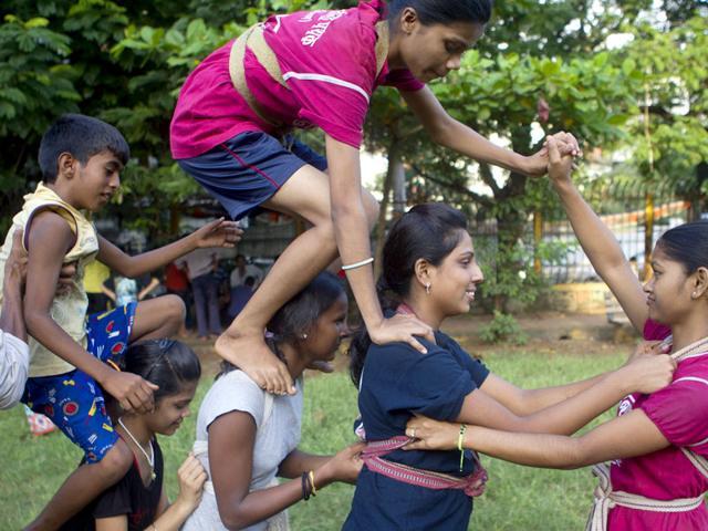 Dahi handi is no longer a men-only feat. A women’s group in Mumbai practises for a dahi handi in this file photo. Dahi handi is no longer a men-only feat. A women’s group in Mumbai practises for a dahi handi in this file photo.
