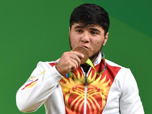 Izzat Artykov competes during the Men's 69kg weightlifting competition at the Rio 2016. (AFP Photo) Izzat Artykov competes during the Men's 69kg weightlifting competition at the Rio 2016. (AFP Photo)