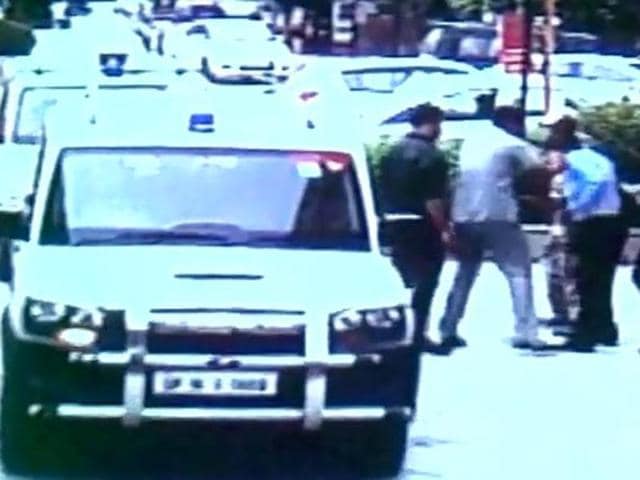 A guard standing next to the man tried to save him from being beaten by Mahesh Sharma’s security officer, but he too was slapped repeatedly in return (Photo: Twitter/ANI) A guard standing next to the man tried to save him from being beaten by Mahesh Sharma’s security officer, but he too was slapped repeatedly in return (Photo: Twitter/ANI)